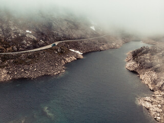Road and lake in mountains Norway