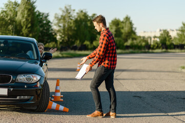 Female student knocks down traffic cone