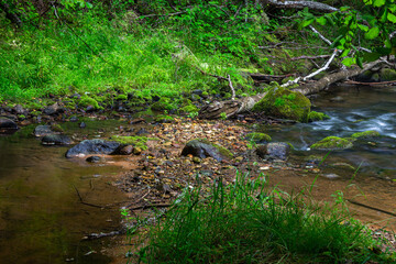 A small rocky river in spring Taken in Latvia, Raunis river