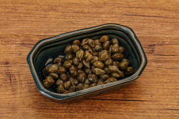 Tasty capers in the bowl