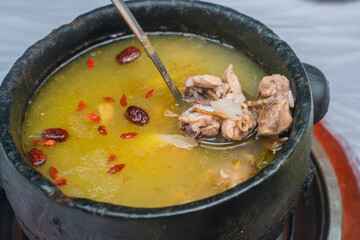 Stone pot chicken, a traditional Tibetan dish.