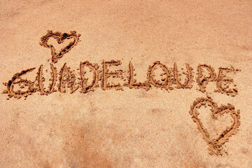 Guadeloupe écriture sur le sable des Antilles