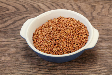 Raw buсkwheat cereal in the bowl