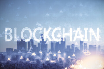 Double exposure of crypto currency theme hologram drawing and city veiw background. Concept of blockchain and bitcoin.