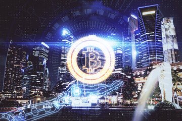 Multi exposure of cryptocurrency theme hologram drawing and city veiw background. Concept of blockchain and bitcoin.