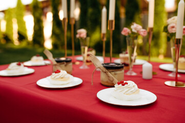 Table setting, tea party with sweets and honey