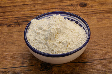 Wheat flour heap in the bowl