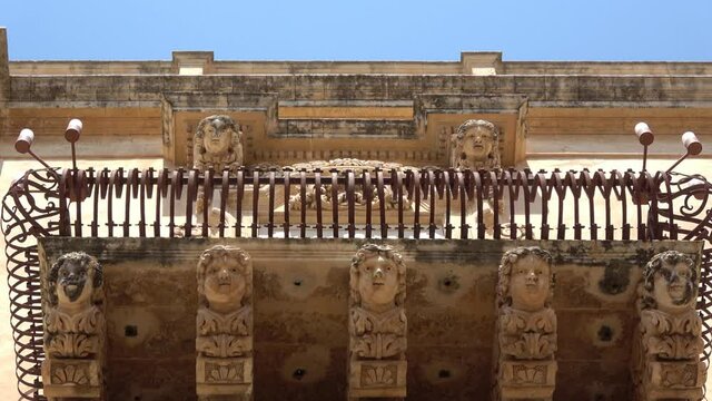 Sicily, Noto town the Baroque Wonder - UNESCO Heritage Site. Detail of Palazzo Nicolaci balcony, the maximum expression of the Sicilian Baroque style.