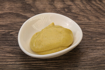 Dijon mustard sauce in the bowl