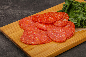 Italian spycy pepperoni sausage slices
