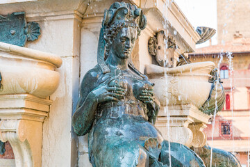 Obraz premium Fountain of Neptune (Italian: Fontana di Nettuno) located in the eponymous square, Piazza del Nettuno, next to Piazza Maggiore, in Bologna, Italy