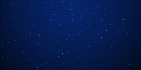 Sparse glowing snow Christmas background. Subtle f