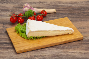 Brie cheese triangle served salad