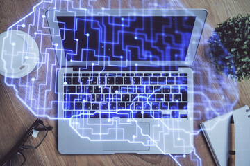 Multi exposure of work table with computer and brain hologram. Brainstorm concept.