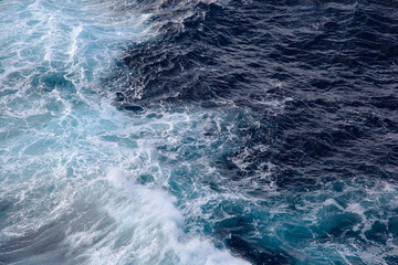 Fototapeta na wymiar sea waves behind the ship