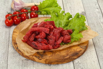 Raw beef meat sliced for cooking