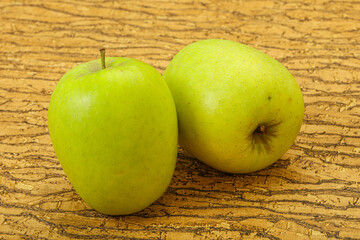 Two ripe green sweet apples