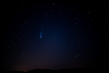 Fototapeta na wymiar Neowise comet shines into the night sky
