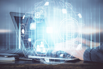 Social network theme hologram with businessman working on computer on background. Concept of world wide web. Multi exposure.