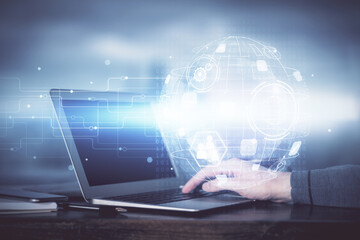 Social network theme hologram with businessman working on computer on background. Concept of world wide web. Multi exposure.