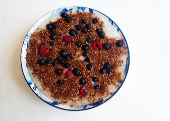Breakfast. Oatmeal with berries and flax seed.