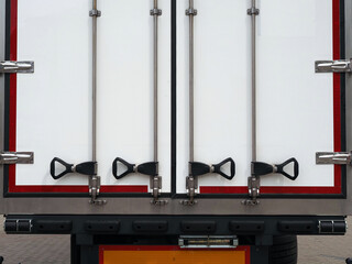 locks on the doors of a trailer or long-distance container