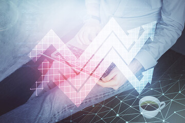 Growing arrows with businessman working on computer on background. Success concept. Double exposure.