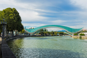 Peace Bridge over the Mtkvari river, Designed by Italian architect Michele de Lucci, Tbilisi, Georgia, Caucasus, Middle East, Asia