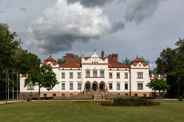 Fototapeta na wymiar Rokiskis manor and park in sunny summer day