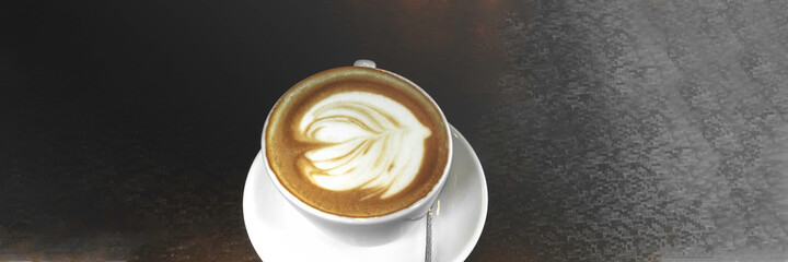 Cup of hot latte or cappuccino art coffee