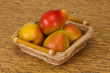 Pear heap in the wooden basket