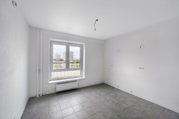 Empty room after repairs in an apartment building