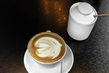 Cup of hot latte or cappuccino art coffee