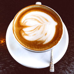 Cup of hot latte or cappuccino art coffee