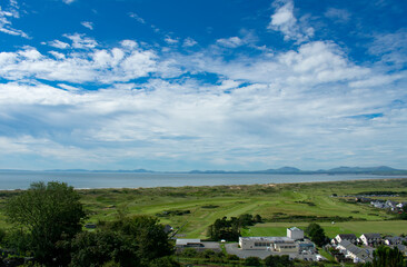 Fototapeta na wymiar View over Cardigan bay to the Llyn Peninsula from the beautiful, historic, Welsh town of Harlech.
