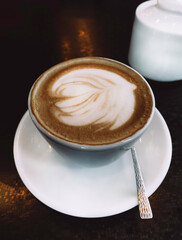 Cup of hot latte or cappuccino art coffee