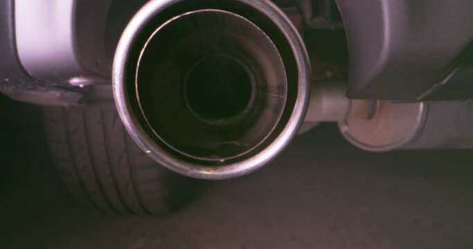 Exhausting pipe emitting smoke