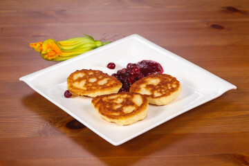 Pancakes with jam and berries