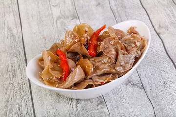 Marinated pork ears with pepper