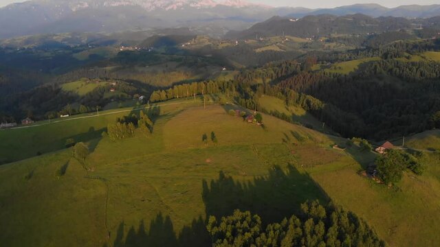 Sunrise over the green hills of Transylvania