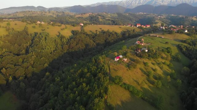 Sunrise over the green hills of Transylvania