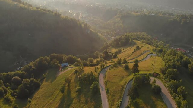 Sunrise over the green hills of Transylvania