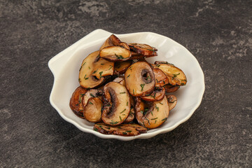 Roasted champignon with herbs and spices