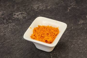 Tumeric powder in the bowl