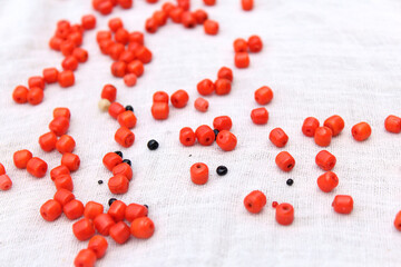 some red and black stone pearl isolated on white background