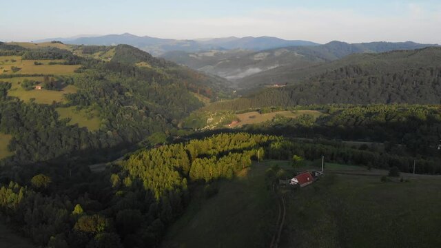 Sunrise over the green hills of Transylvania