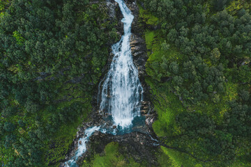 Waterfall Ovstebrufossen aerial view landscape in Norway mountains travel drone scenery wilderness nature
