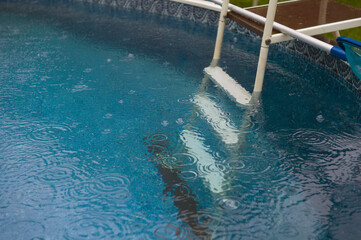Swimming pool in a rainy day
