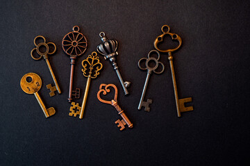 Many different old keys from different locks, scattered chaotically,