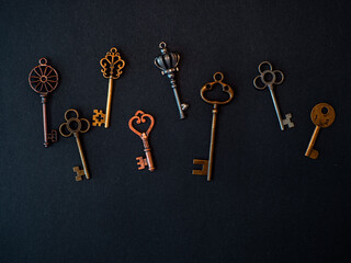 Many different old keys from different locks, scattered chaotically,